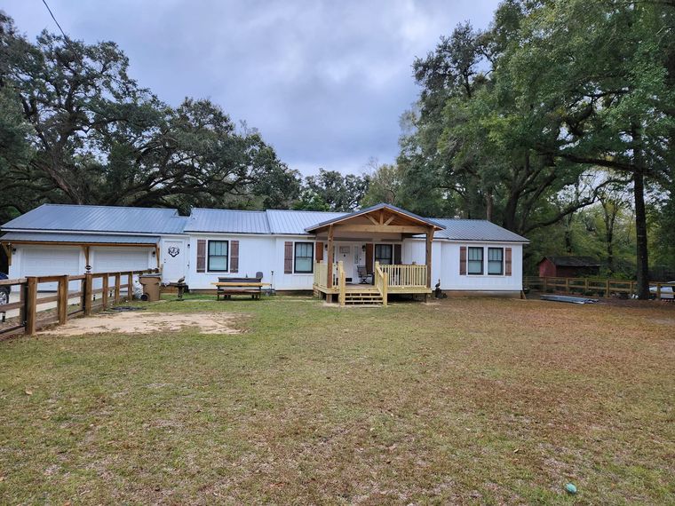 Room addition with covered porch on a Mobile home