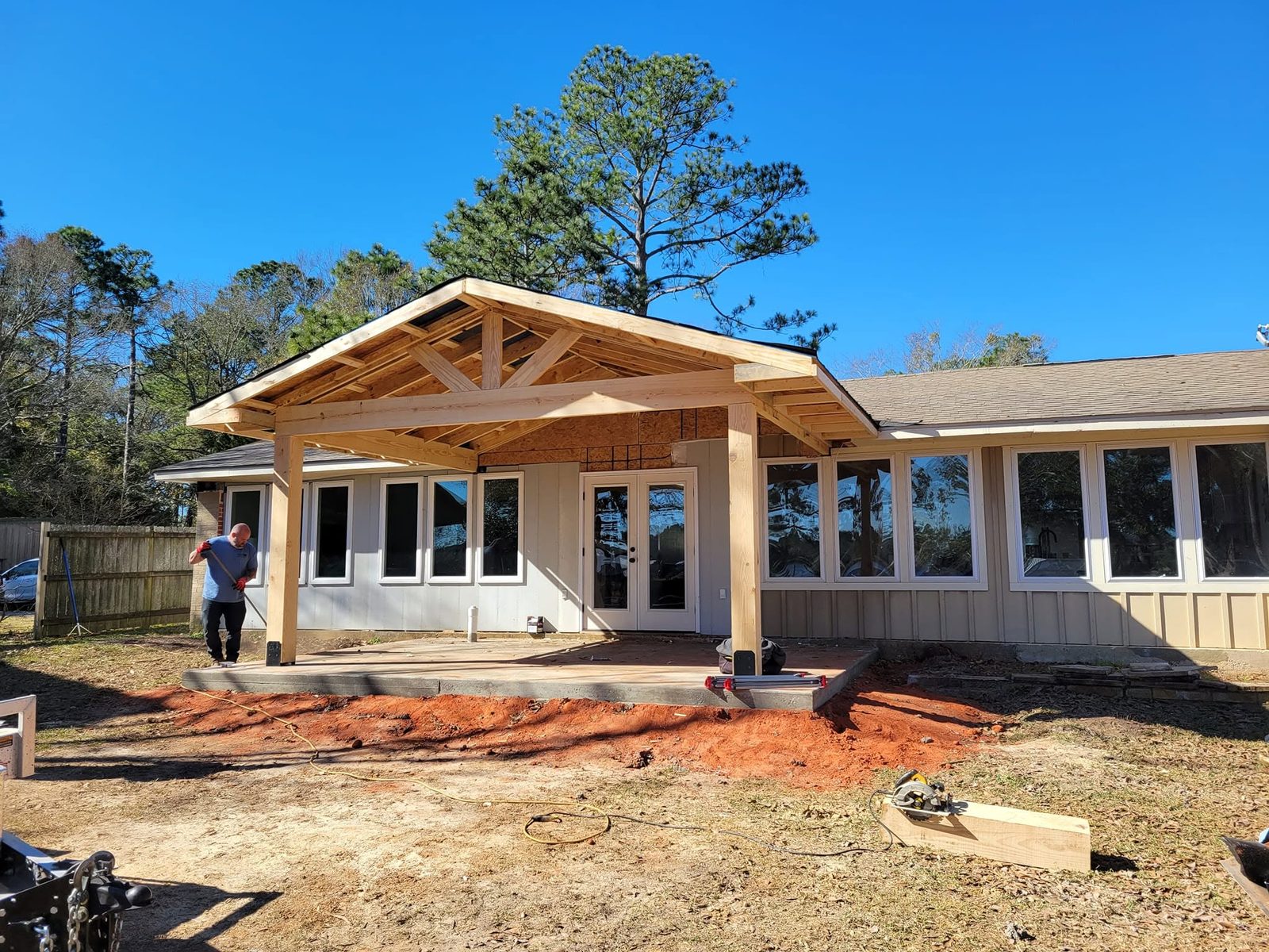 Covered patio addition with exposed timber framing