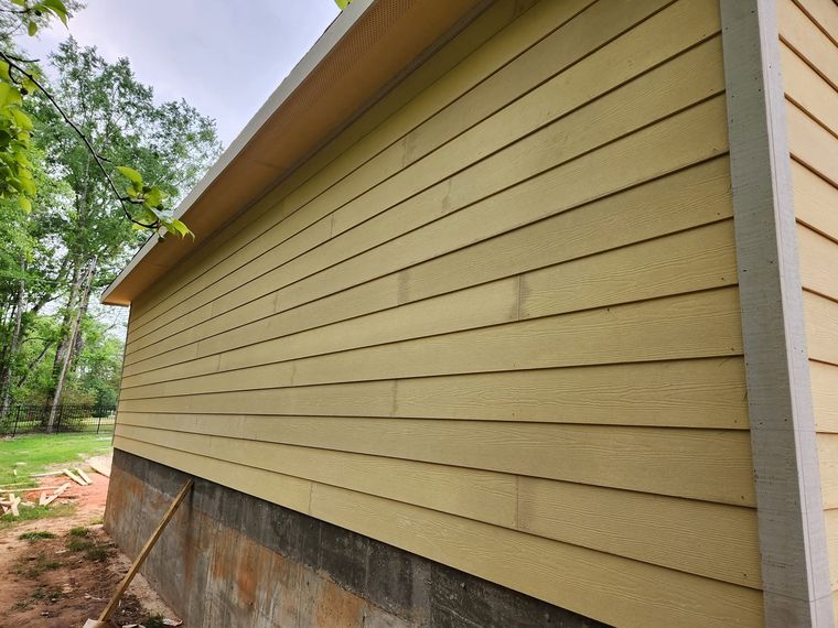 New lap siding installed on a house